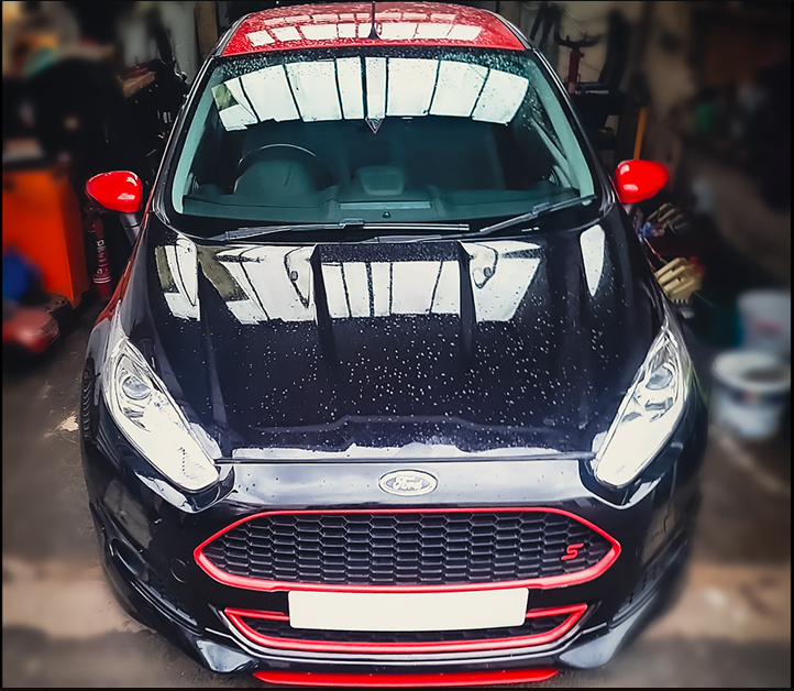 Car at J.R. Garage workshop in Heywood